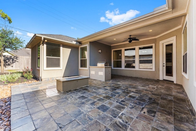 view of patio / terrace with ceiling fan