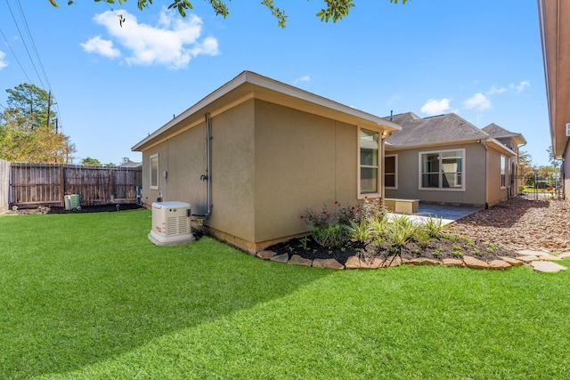 rear view of house with a lawn