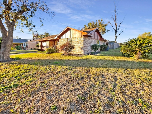 view of home's exterior featuring a yard