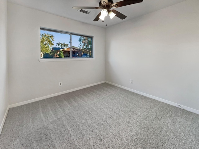 unfurnished room featuring carpet floors and ceiling fan