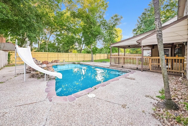 view of pool featuring a water slide