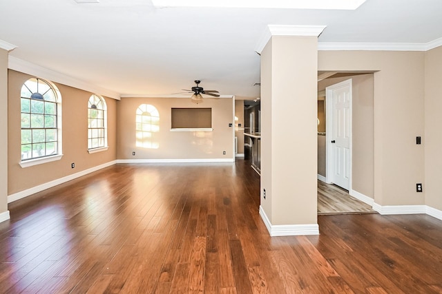 unfurnished living room featuring crown molding, ceiling fan, and dark wood-type flooring