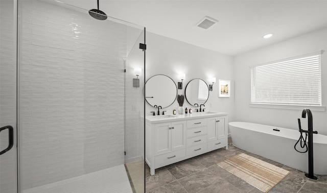 bathroom featuring vanity and plus walk in shower