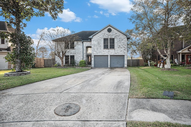 view of front of property with a front yard and a garage