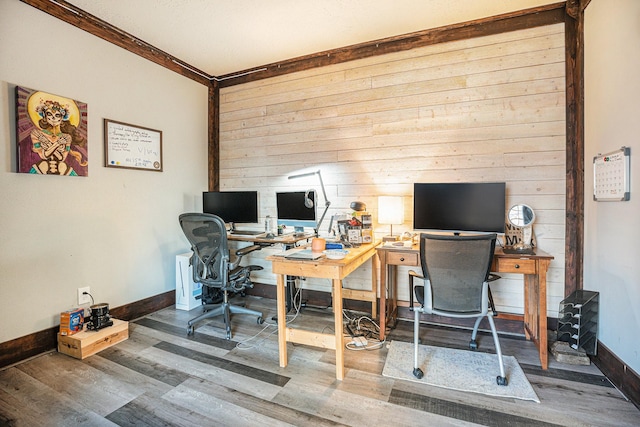 home office featuring crown molding and wood-type flooring