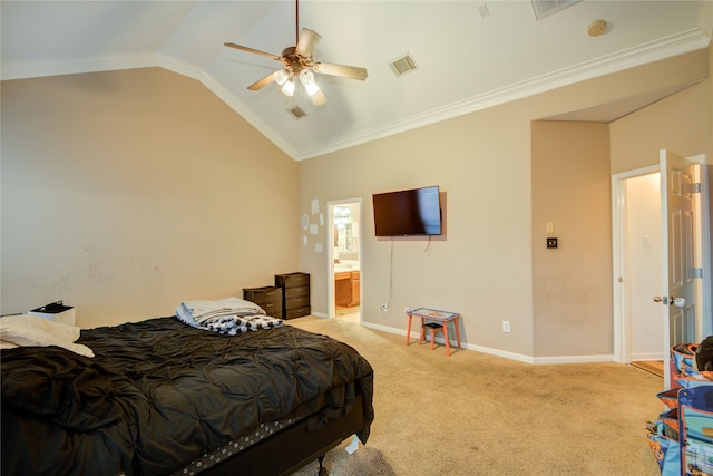 carpeted bedroom featuring connected bathroom, ceiling fan, lofted ceiling, and ornamental molding