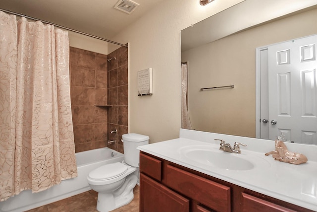 full bathroom featuring shower / bath combination with curtain, vanity, toilet, and tile patterned floors