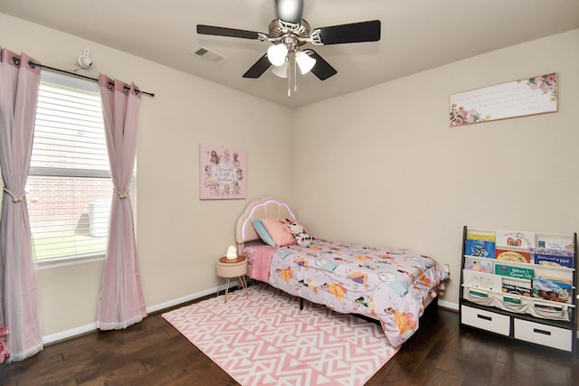 bedroom with ceiling fan and dark wood-type flooring