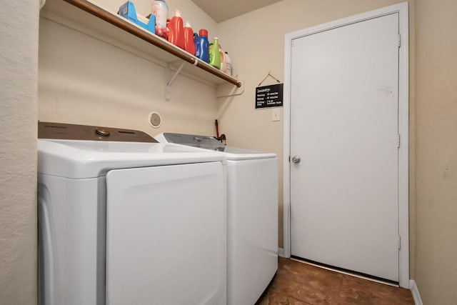 washroom featuring washer and dryer