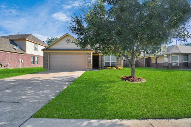 view of front of home with a garage and a front lawn