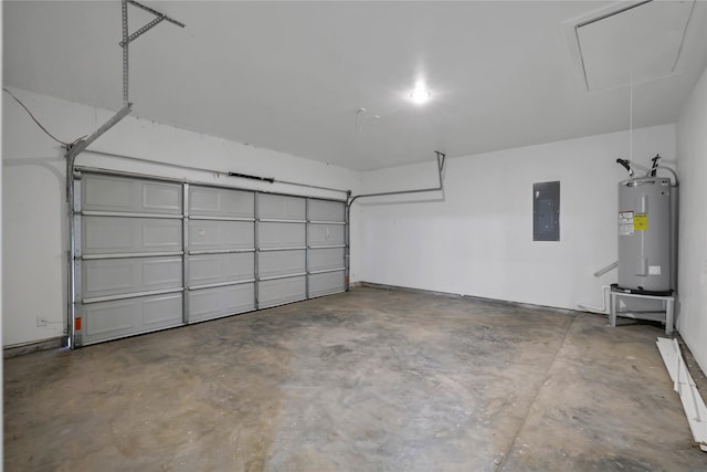 garage featuring electric water heater and electric panel