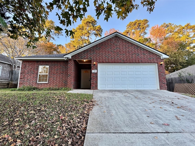 single story home with a garage