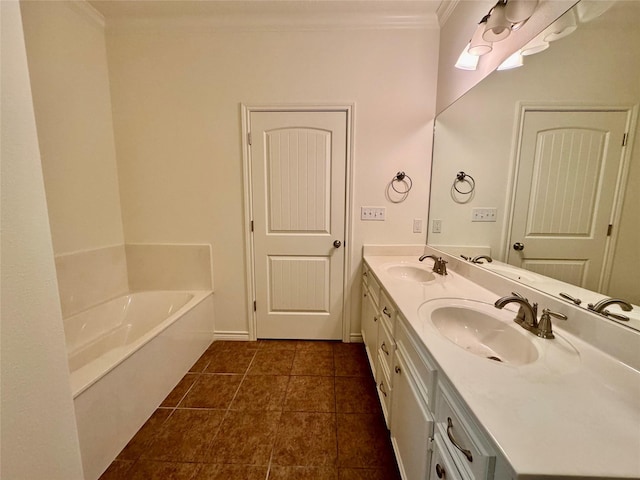 bathroom featuring tile patterned flooring, a bathtub, vanity, and ornamental molding