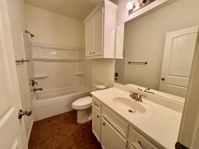 full bathroom with tile patterned flooring, vanity, washtub / shower combination, and toilet