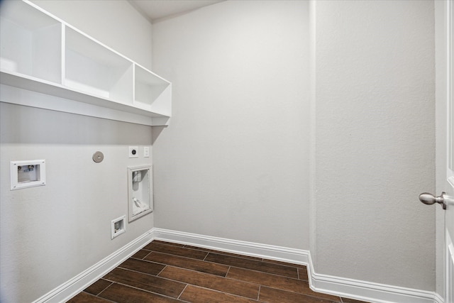 washroom with hookup for a washing machine, hookup for a gas dryer, dark hardwood / wood-style flooring, and hookup for an electric dryer