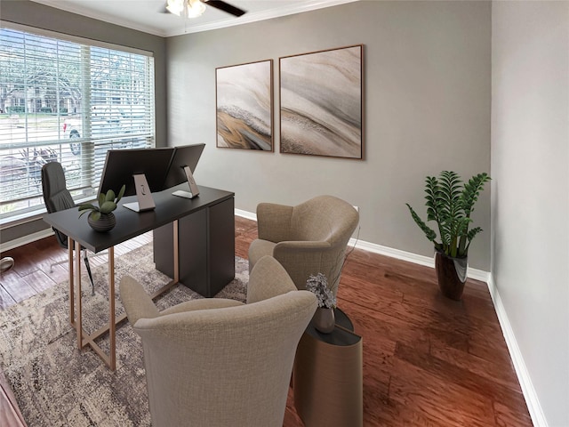 office with ceiling fan, crown molding, and dark wood-type flooring