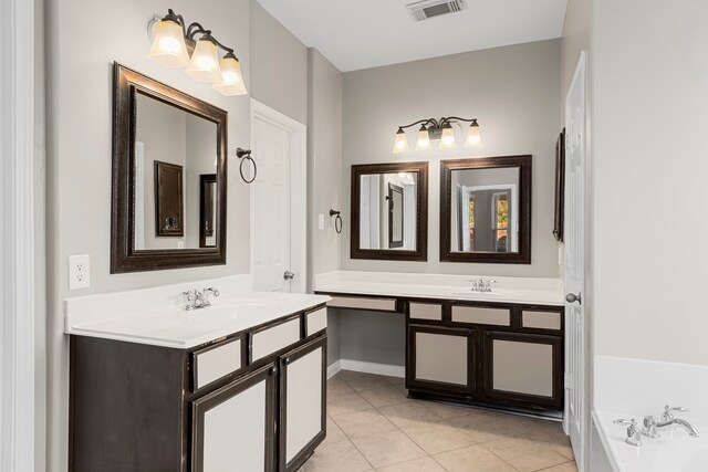 411 White Oak Pointe, League City, TX 77573 - full bath featuring a sink, visible vents, two vanities, and tile patterned flooring