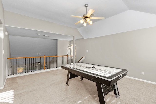 playroom with ceiling fan, light carpet, and vaulted ceiling