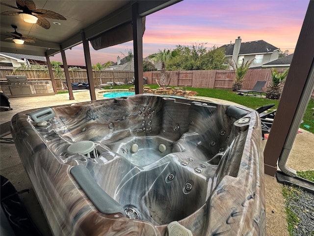 411 White Oak Pointe, League City, TX 77573 - exterior details featuring a jacuzzi, a pool, a ceiling fan, and a fenced backyard