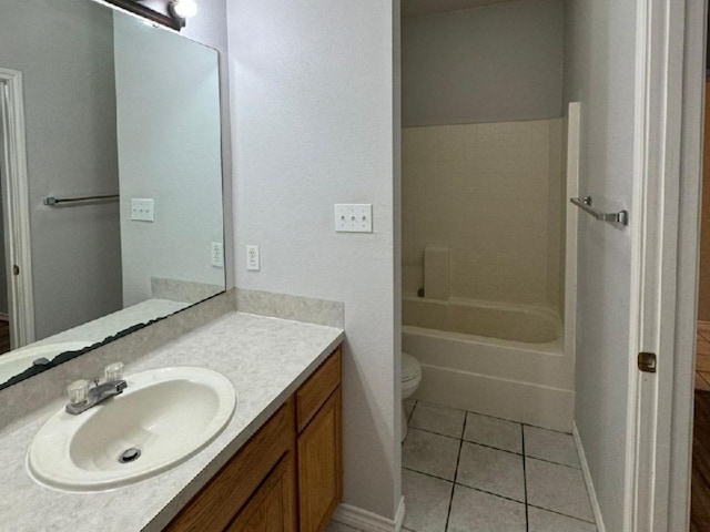 full bathroom with tile patterned floors, vanity, toilet, and bathing tub / shower combination