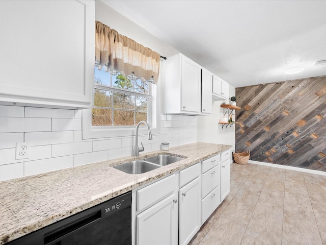 kitchen featuring backsplash, dishwashing machine, sink, white cabinets, and light tile patterned flooring