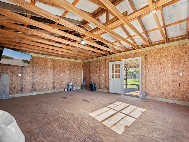 miscellaneous room featuring lofted ceiling