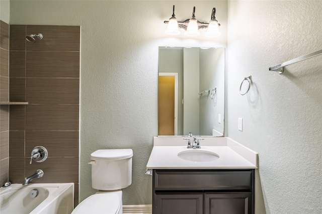 full bathroom with bathing tub / shower combination, vanity, and toilet