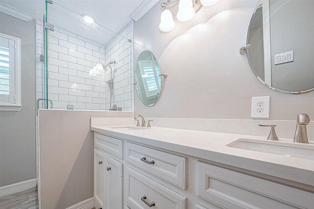 bathroom featuring crown molding, hardwood / wood-style floors, vanity, and an enclosed shower