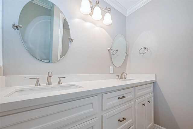 bathroom with vanity and ornamental molding