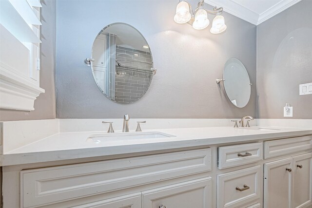 bathroom with vanity and ornamental molding