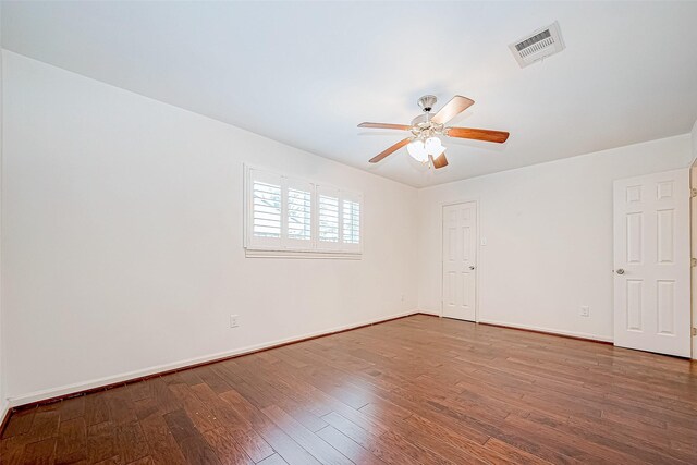 unfurnished room with ceiling fan and wood-type flooring