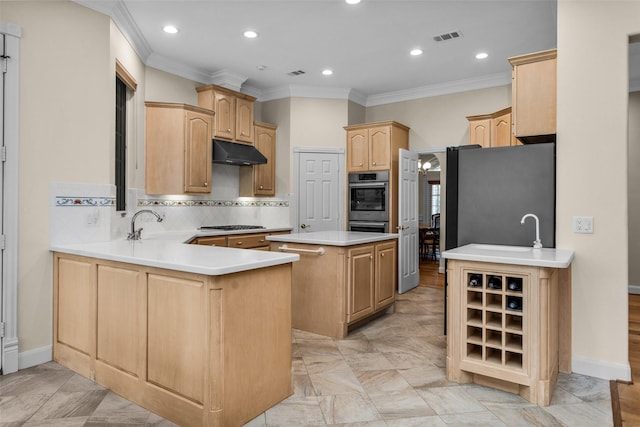 kitchen with kitchen peninsula, crown molding, light brown cabinets, and a kitchen island