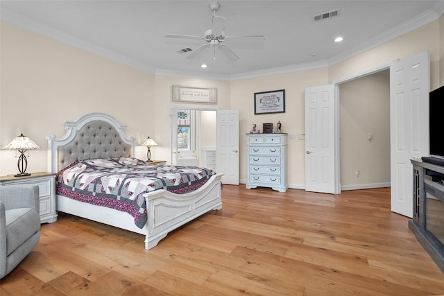 bedroom with ceiling fan, ornamental molding, and light hardwood / wood-style flooring