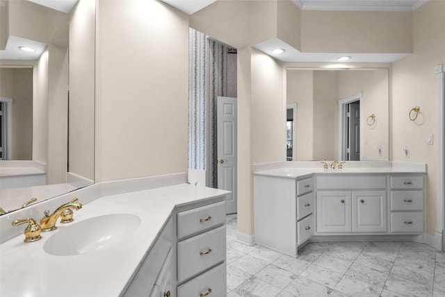 bathroom featuring vanity and crown molding