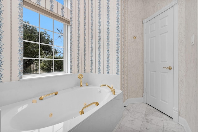 bathroom with a tub