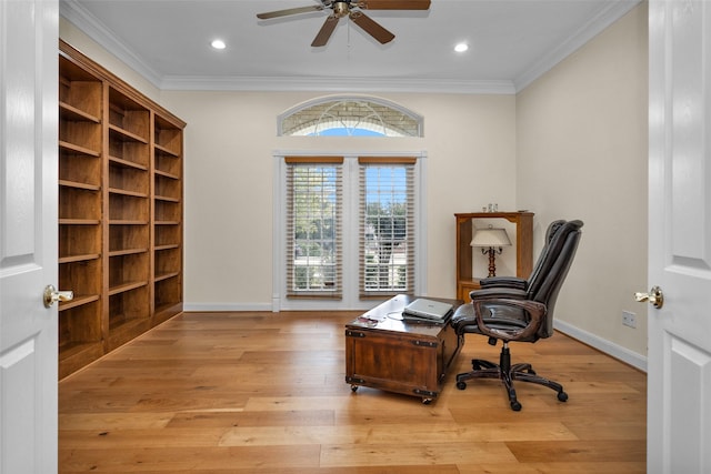 office area featuring ceiling fan, light hardwood / wood-style flooring, and ornamental molding