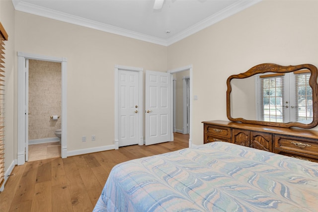 bedroom with connected bathroom, light hardwood / wood-style floors, ceiling fan, and ornamental molding