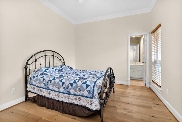 bedroom with ensuite bathroom, ceiling fan, ornamental molding, and light hardwood / wood-style flooring