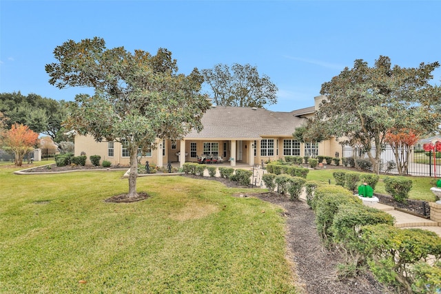 view of front of house with a front lawn