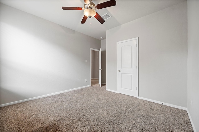 unfurnished bedroom with ceiling fan and carpet