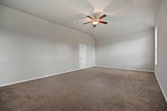 unfurnished room featuring carpet, ceiling fan, and lofted ceiling