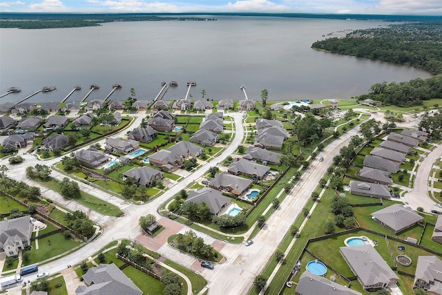 drone / aerial view with a water view