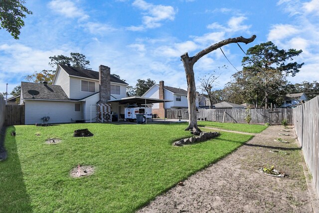 view of yard featuring a carport