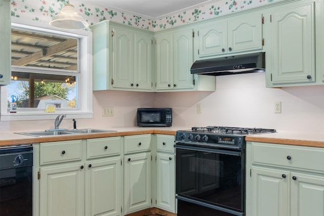 kitchen with crown molding, sink, and black appliances