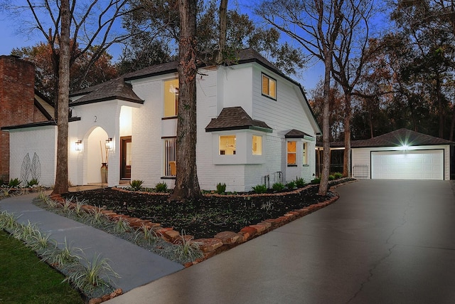 view of front of house featuring an outbuilding and a garage