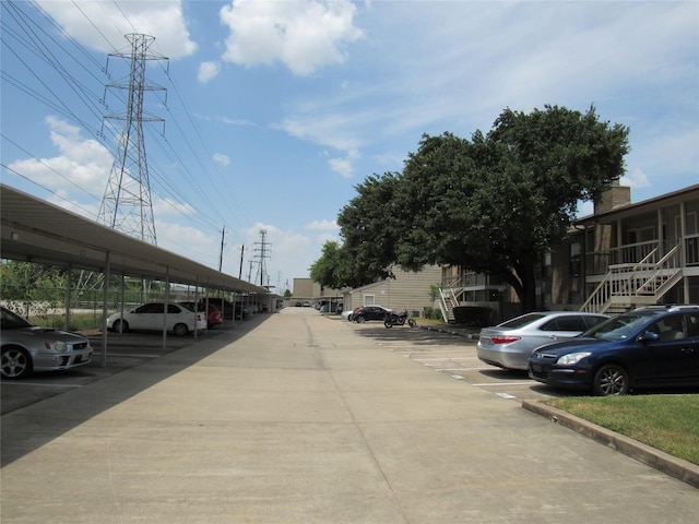 view of parking featuring a carport