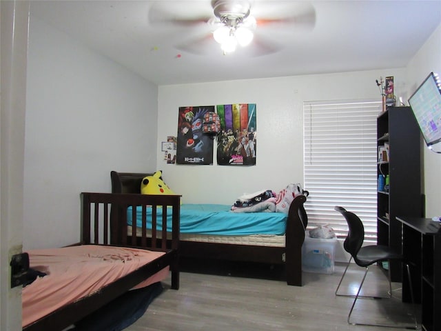 bedroom featuring ceiling fan and light wood-type flooring