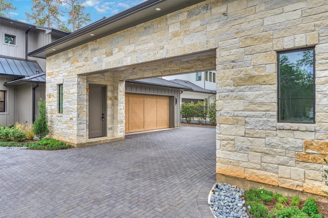 exterior space with a garage