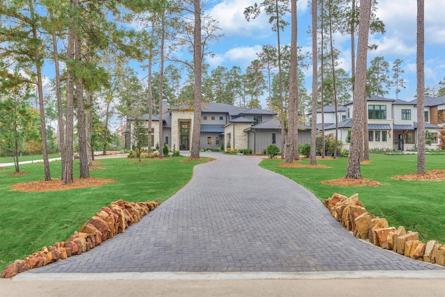 view of front of property with a front lawn