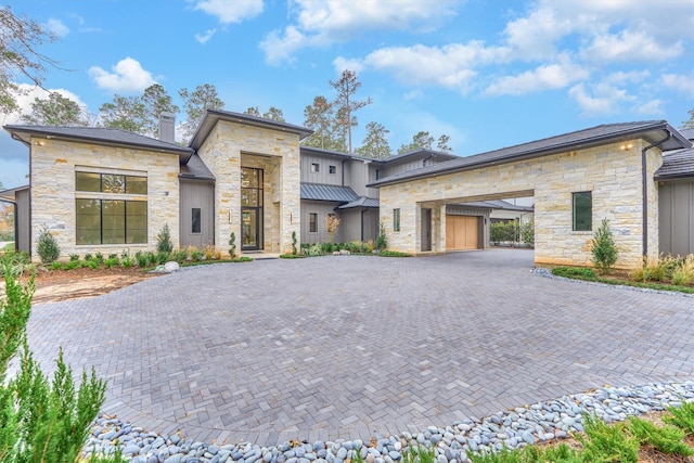 view of front of house with a garage